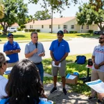 Casey Askar engaging with Florida voters at a community event, showcasing active political discussion.